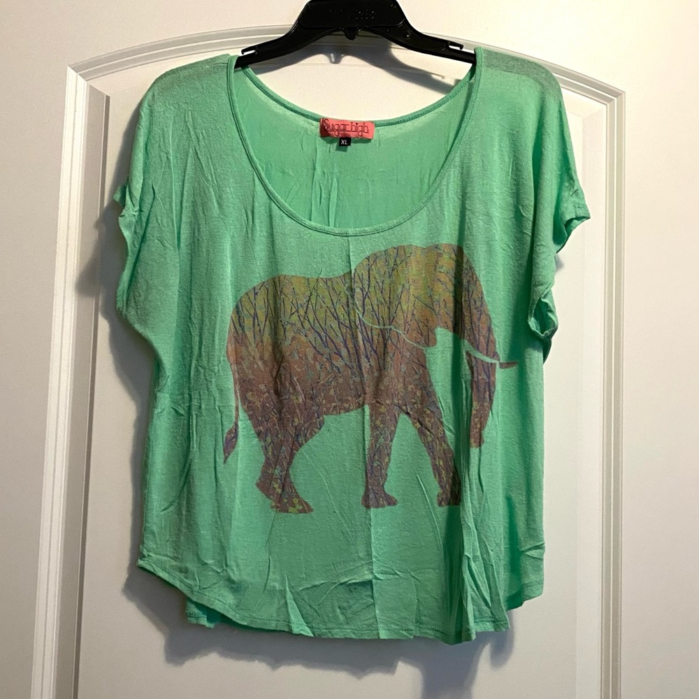 Green short sleeve top with elephant on the front